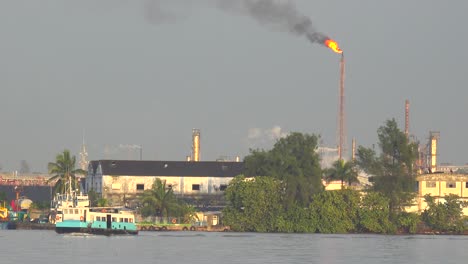 Harbor-ferry-boats-pass-in-Havana-harbor-Cuba-with-an-industrial-scene-as-a-backdrop-2