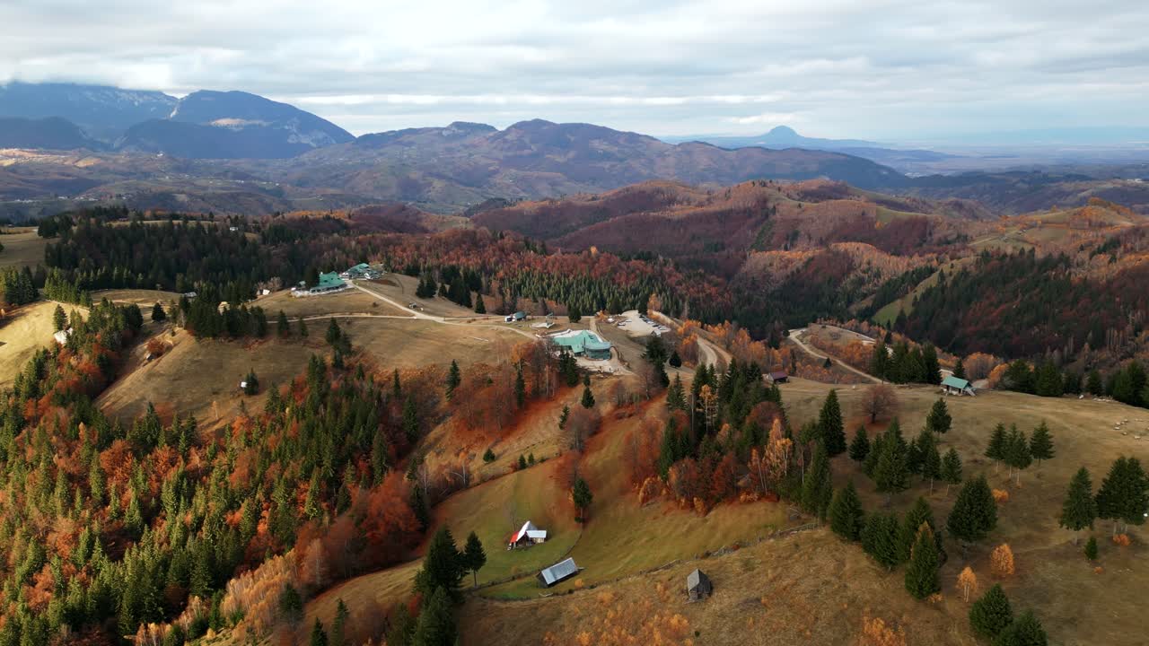 Amfiteatrul Transilvania Ecological Complex Overlooking Bucegi Mountains In Moieciu de Sus, Romania. Aerial Drone Shot