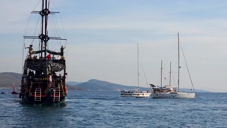 tour ship laden with tourists approaches the pier, unveiling the coastal beauty of this vibrant seaside saranda