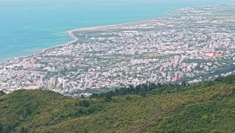 saint denis, la reunion, aerial with city and coast in the background and hills in the foregound