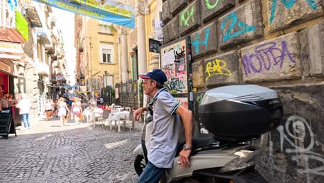 people walking in a vibrant naples street