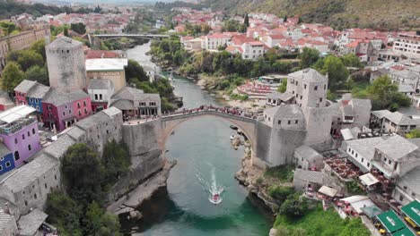aerial: the stari most from above in a stand still position