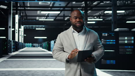 vertical video data center engineer monitoring servers performing ai training