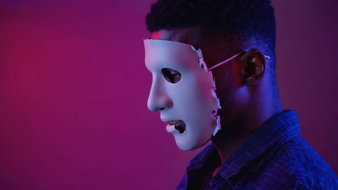 Man with mask in dark portrait