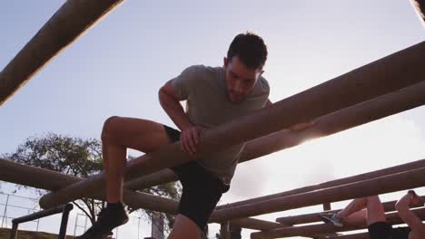 young adults training at an outdoor gym bootcamp