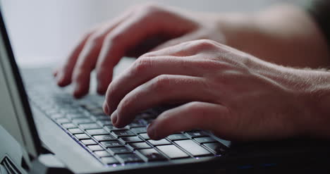 Business-Businessman-Hands-Type-On-Laptop-Computer-Close-Up-1