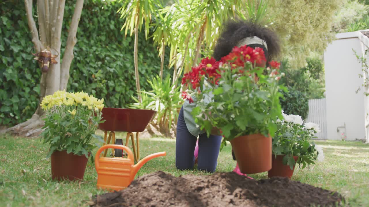 Little girl gardening during a sunny day