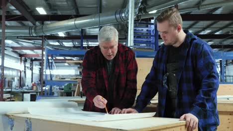 carpenter at work in woodshop