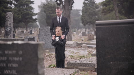 child, death or father in graveyard for funeral