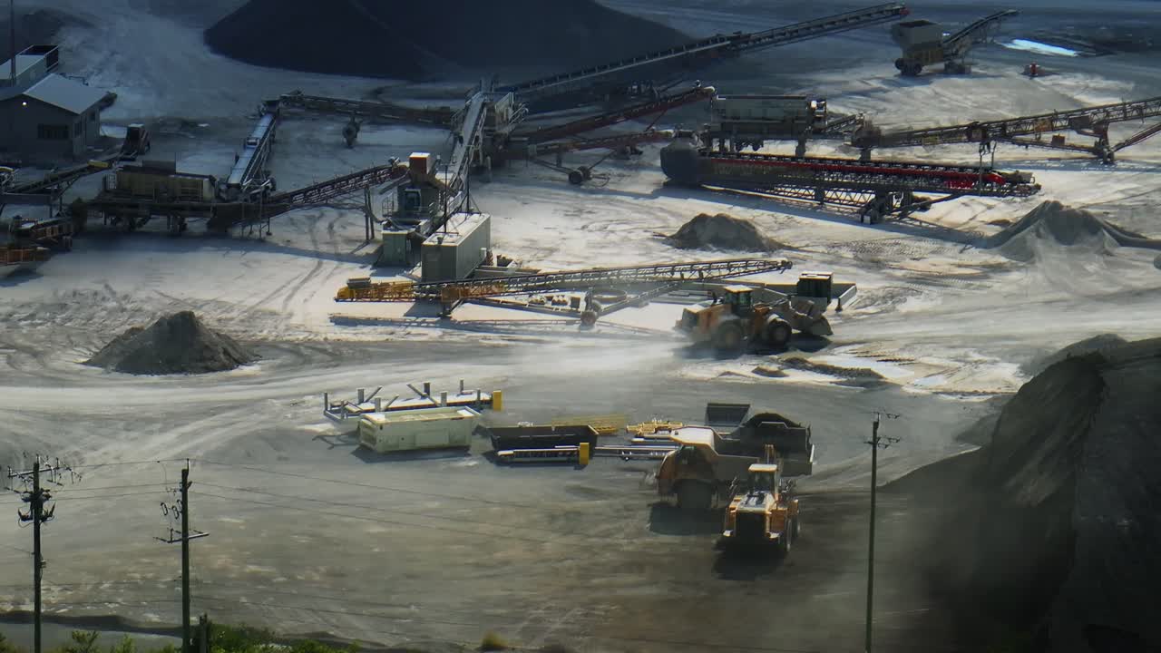 Workers and machinery at large mining quarry in Stittsville in Canada