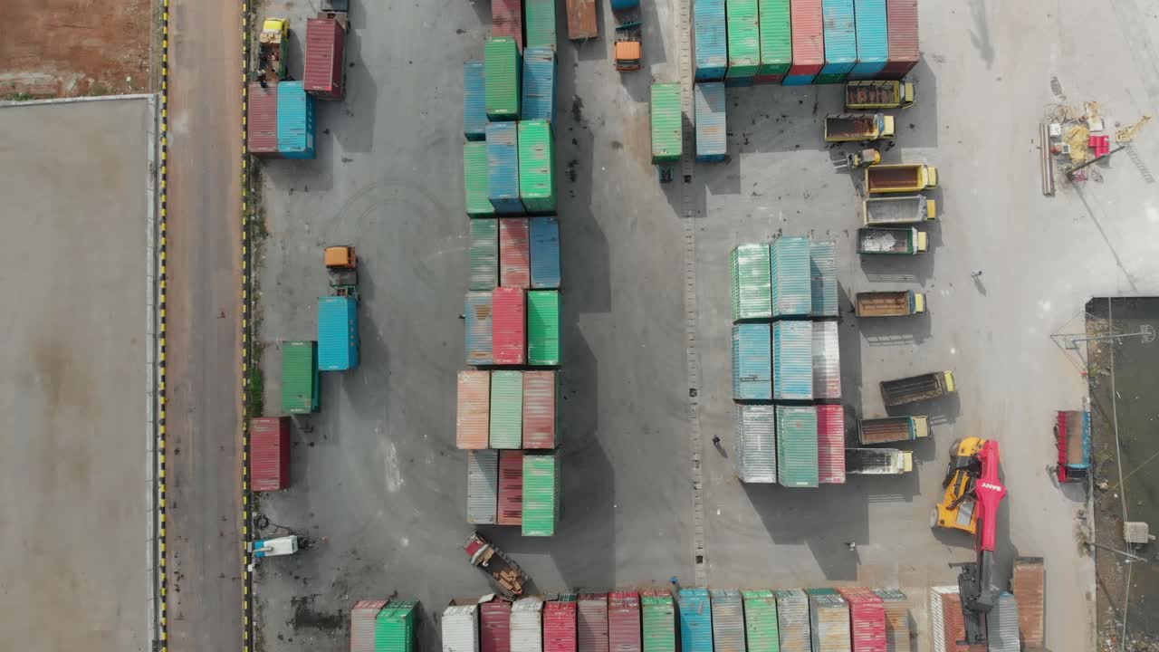 Top down view of cargo port with sea containers at Belitung indonesia, aerial