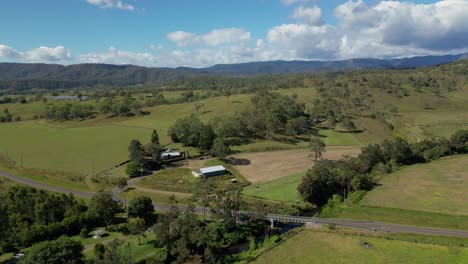 aerial views over farmland in lamington in the scenic rim, queensland, australia