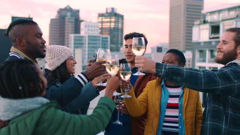 friends celebrating on a rooftop with city views