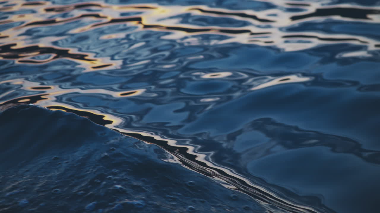 Rippled Water Surface at Sunset
