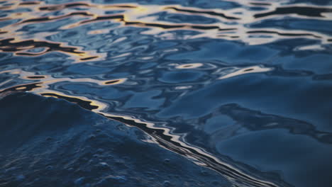 rippled water surface at sunset