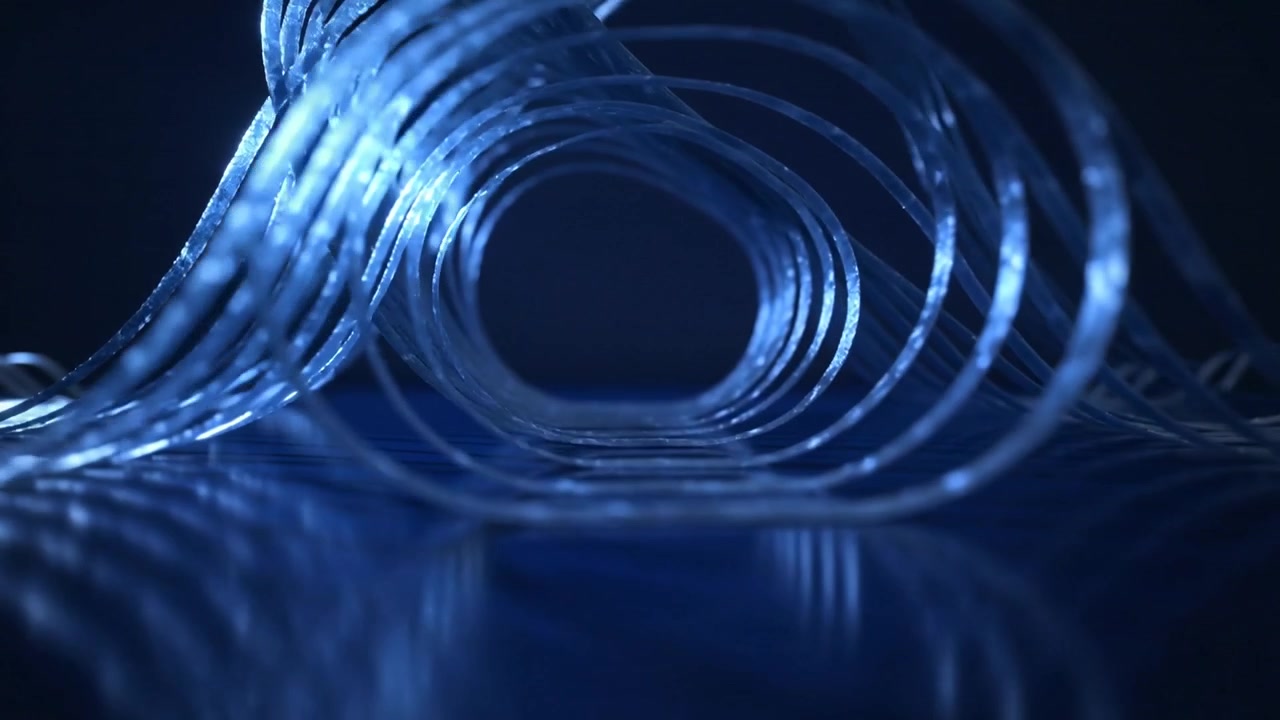 Starting low-angle cam clear spirals curling into studio tunnel, rear roll blue lights showing core