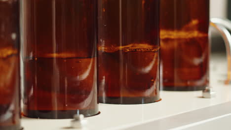 bottles being filled in a bottling line