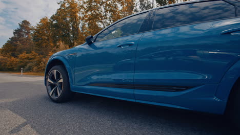 audi e tron profile view. audi e tron, a fully electric car on highway