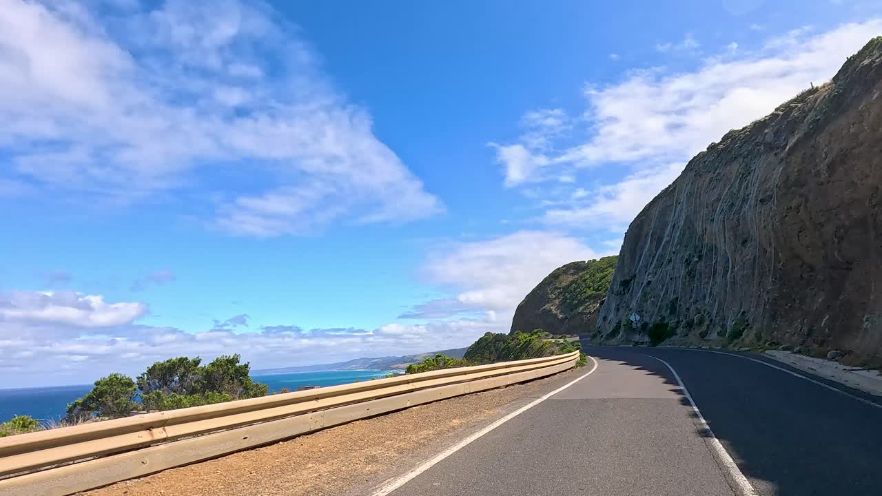 A 14-second video captures a drive along the Great Ocean Road, showcasing stunning coastal views and vibrant blue skies