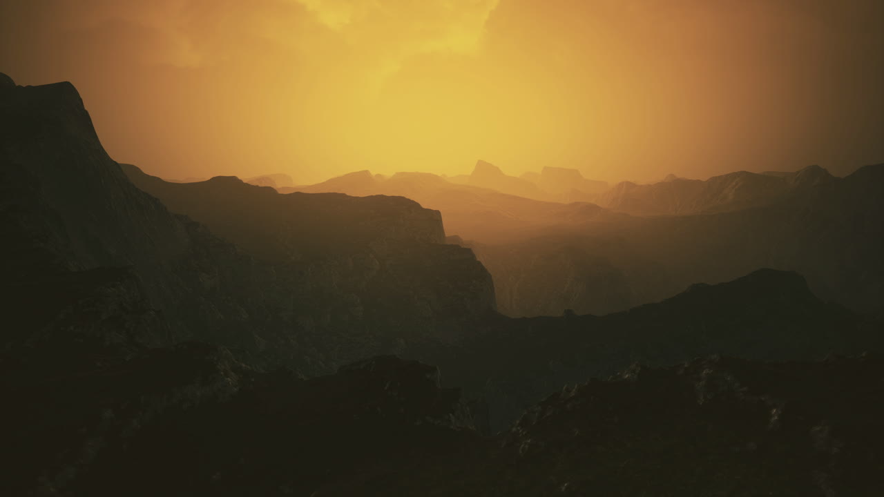 Majestic golden hour over mountainous landscape at dusk