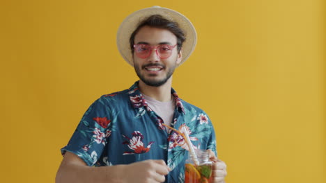 man enjoying a summer drink