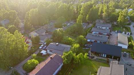 Aerial-tracking-view-of-a-modern-neighborhood-in-Helsinki,-summer-day-in-Finland