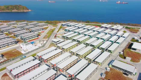 Covid19-Quarantine-compound-buildings-in-the-outskirts-of-Hong-Kong,-Aerial-view