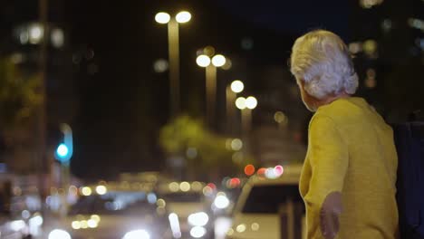 senior man walking with backpack in the city 4k