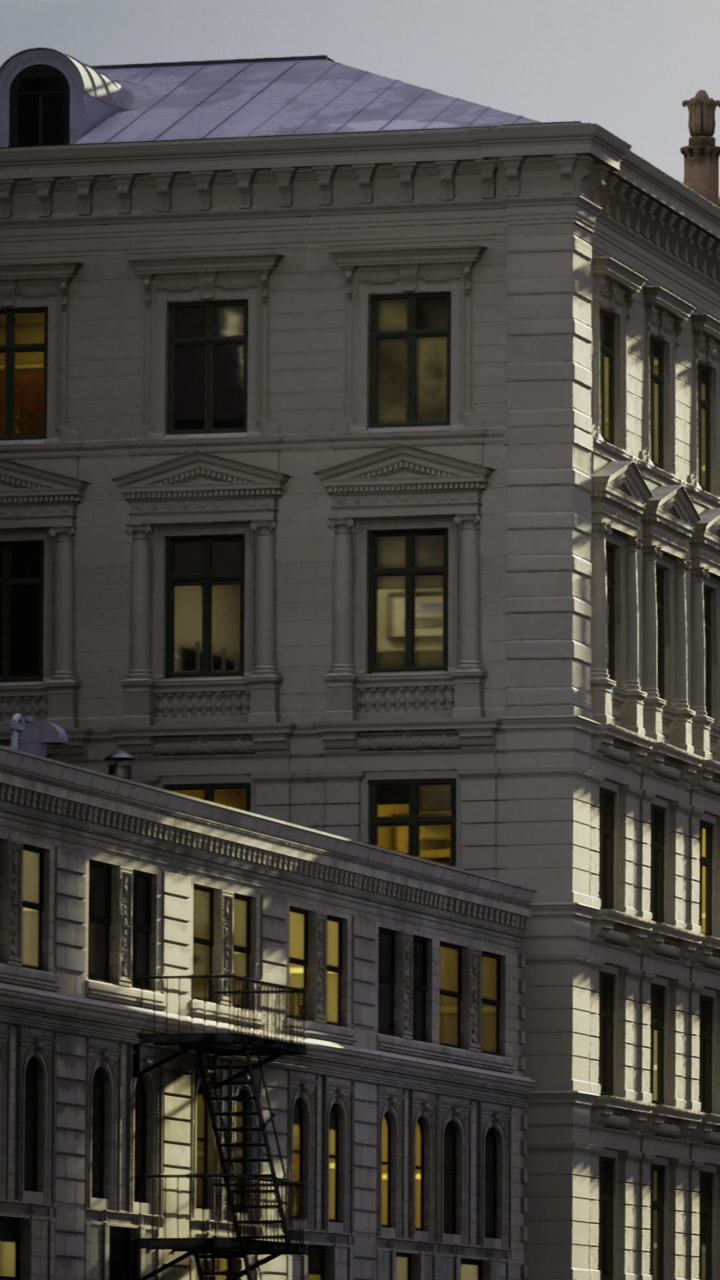 Building structure with windows and fire escape during evening hours
