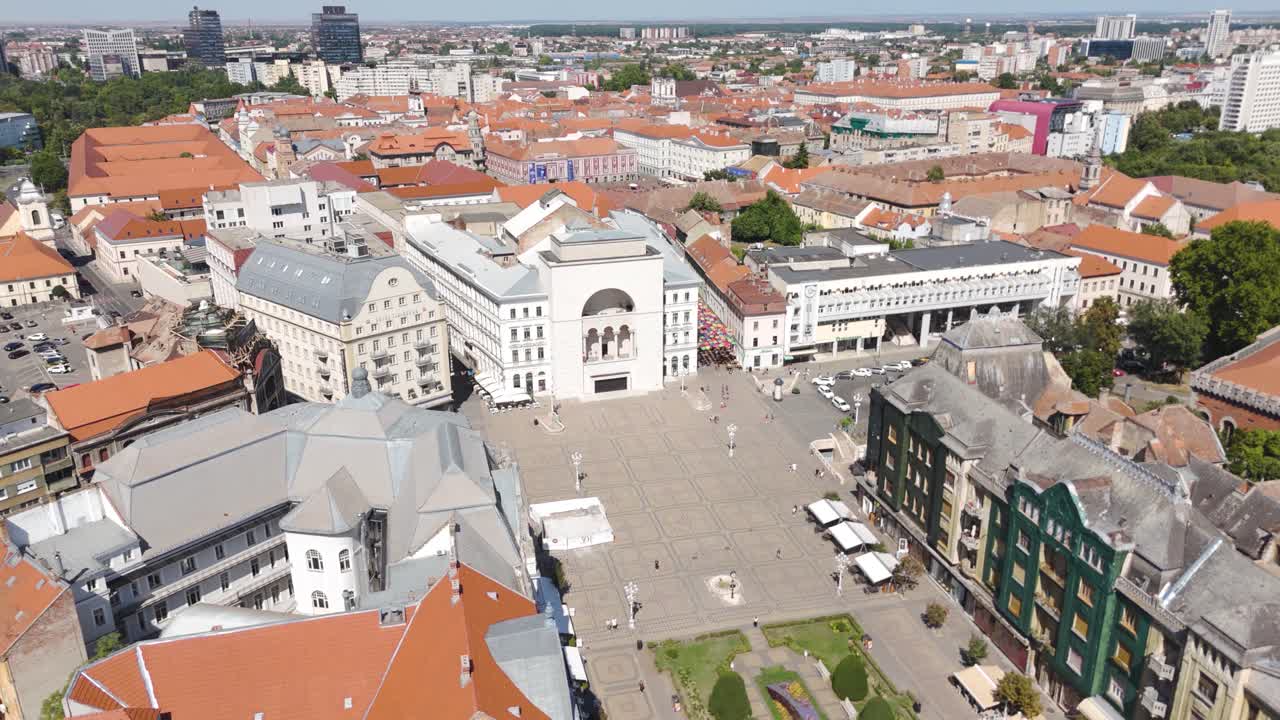 Scenic drone view over Timisoara’s Victory Square, showcasing the iconic National Opera House with the urban square and nearby buildings