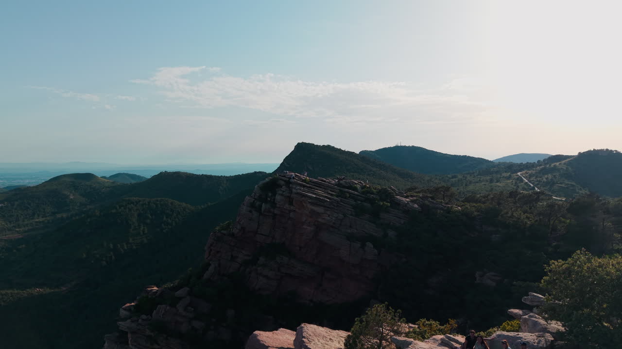 Aerial View of People on a Rocky Mountain Ridge
