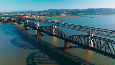 aerial view of a historic bridge over a bay