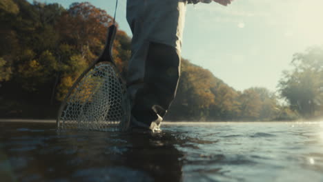 fly fishing in autumn river