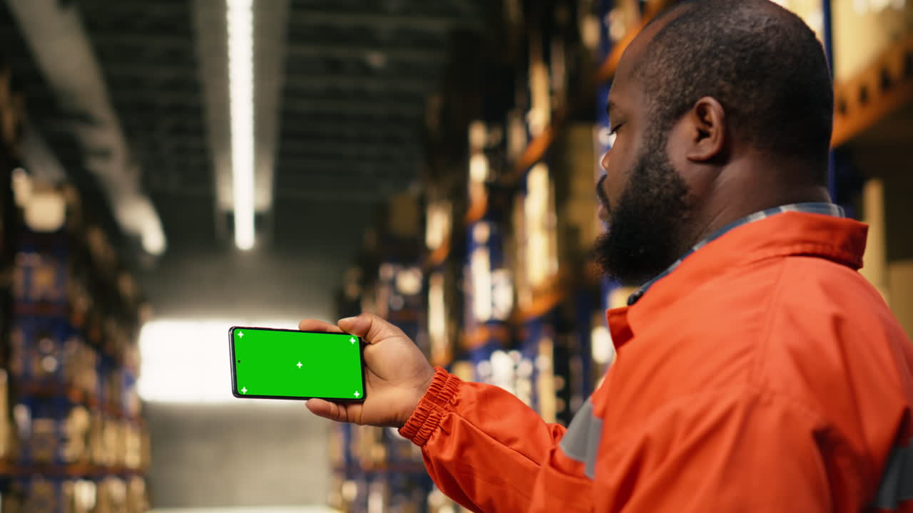Isolated mockup on phone screen with black personnel working on cargo dispatch