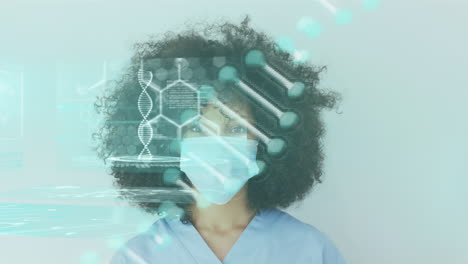 animation of data processing over african american female nurse wearing face mask