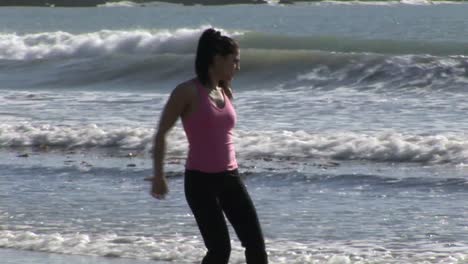 woman on beach running