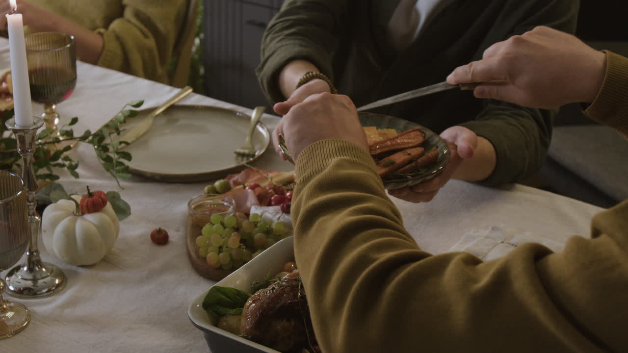 A Family Gathering Around a Holiday Dinner Table