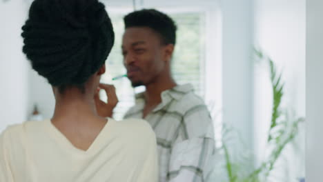 Black-couple,-brushing-teeth-and-dance-with-a-man