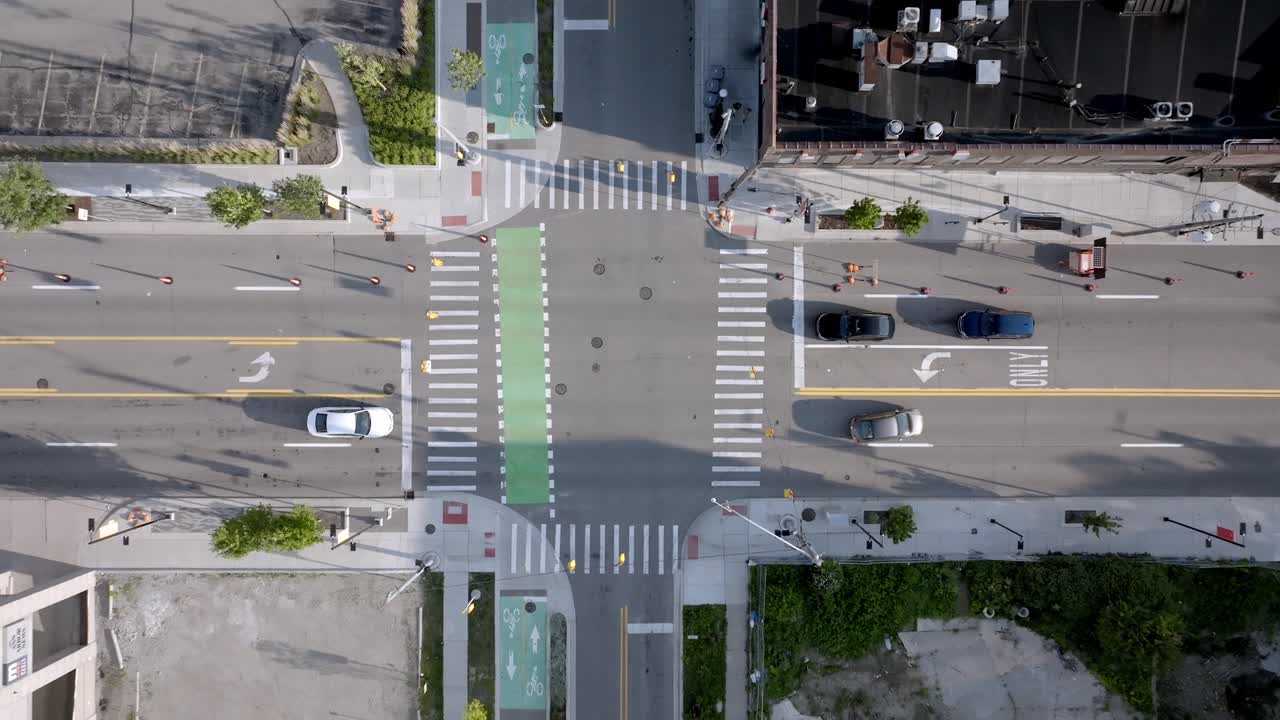 Downtown Ann Arbor, Michigan intersection with drone video moving up