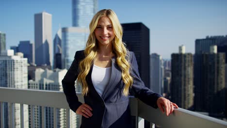 portrait of young american businesswoman on city rooftop