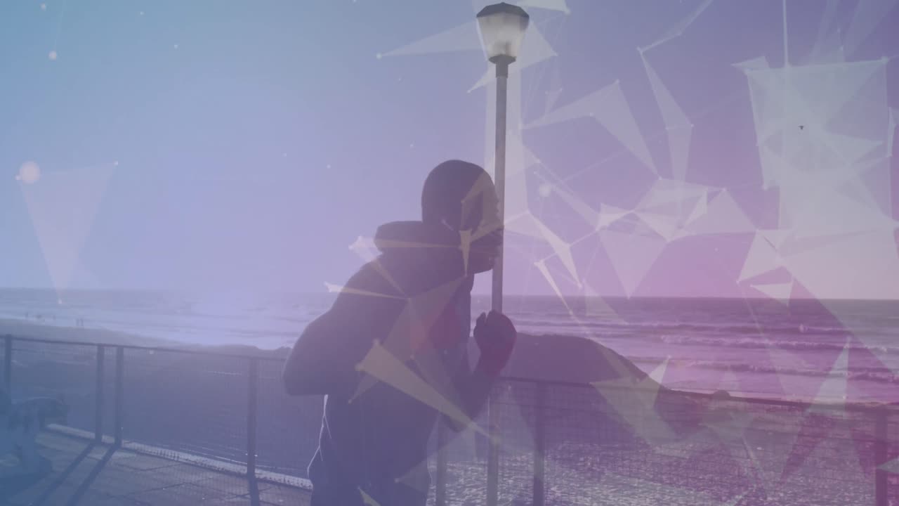 아프리카계 미국인 피트 남자가 산책로에서 달리면서 권투를 연습하는 것에 대한 플렉서스 네트워크