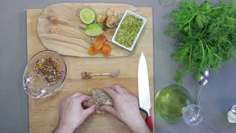 cutting turkey in a kitchen cenital view