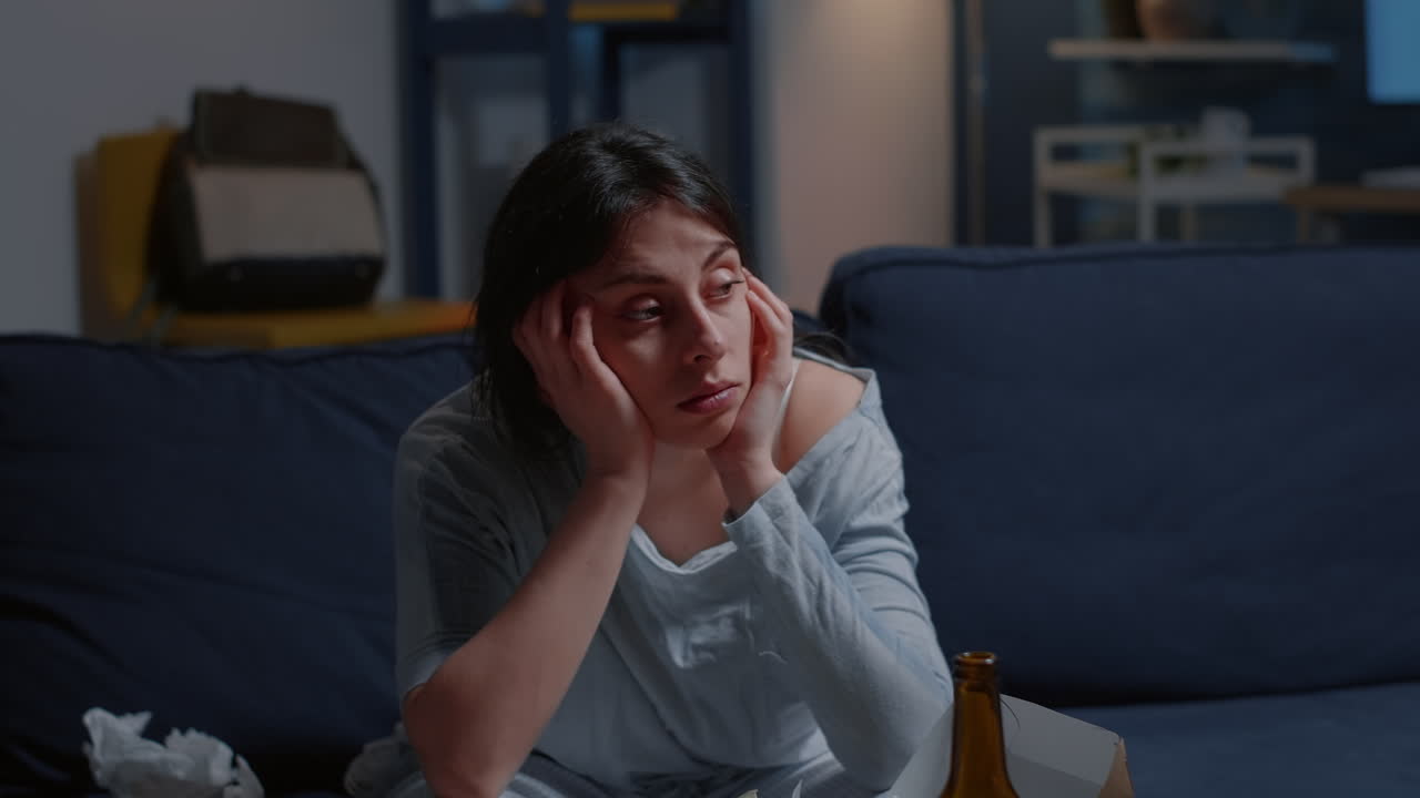 Traumatized unhappy lonely depressed woman putting hands on head