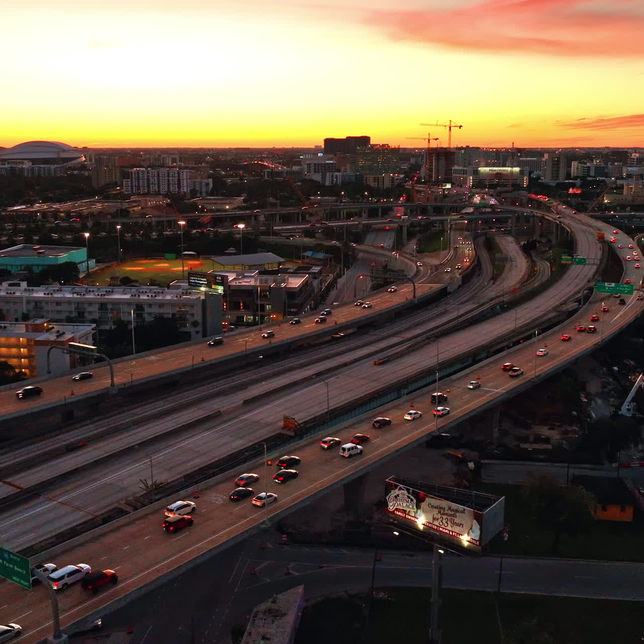 Lively vibrant city scenery at the end of the day. Miami landscape at sundown from aerial perspective.