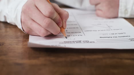 Close-up-view-of-student-hands