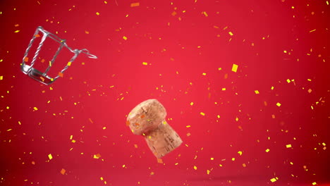 animation of confetti over champagne cork on red background