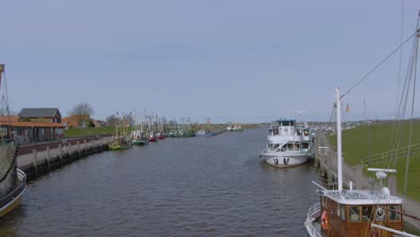 drone flight over a small fishing harbor in germany