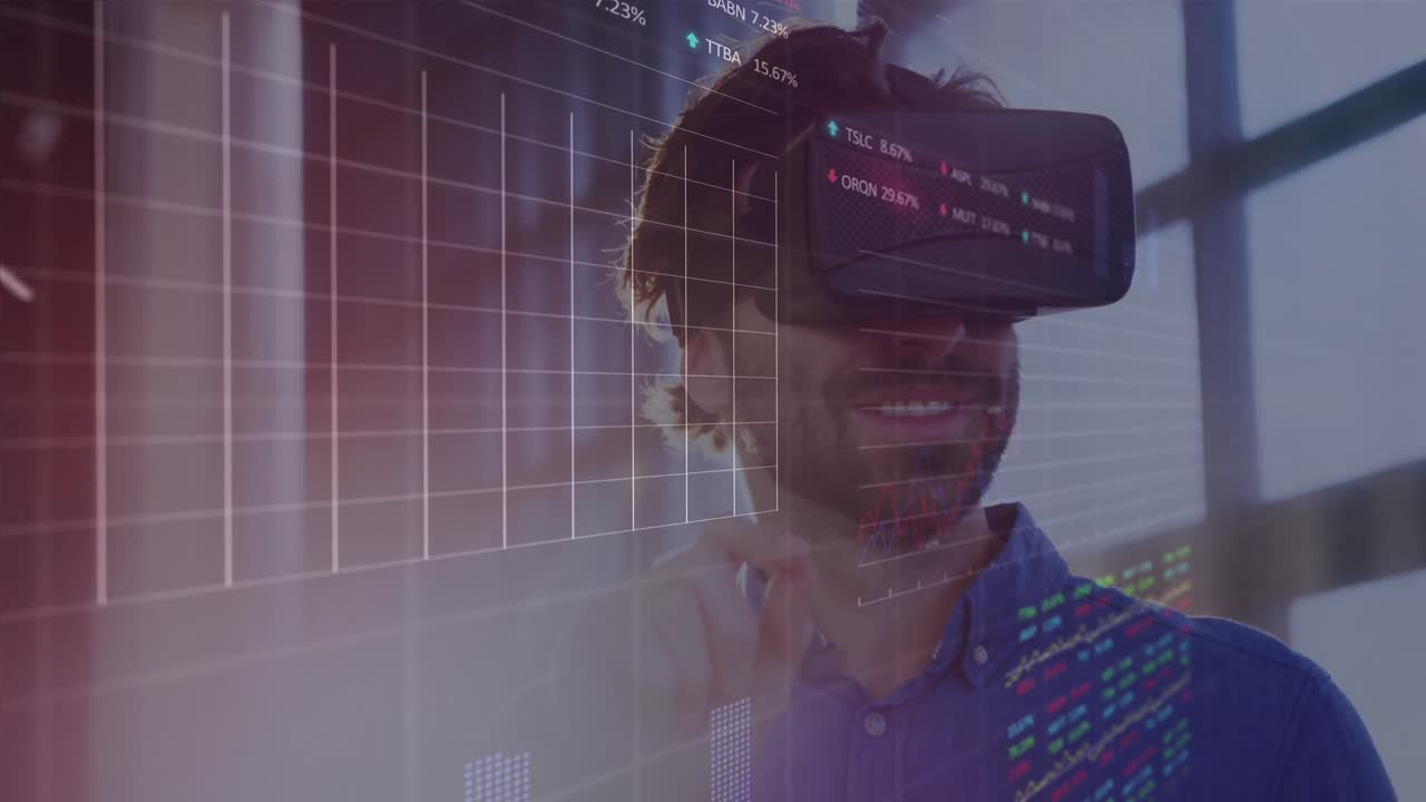 Financial data over man holding VR headset smilling.
