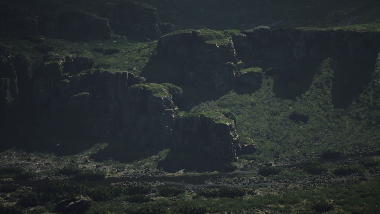 Rocky landscape with lush greenery in a secluded mountain region