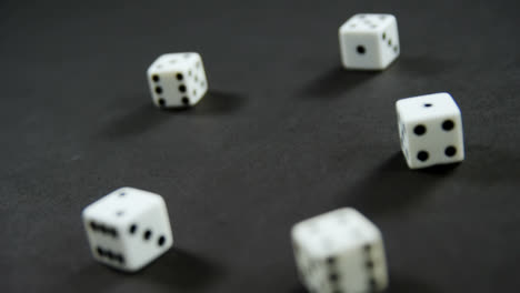 Animation-of-covid-19-numbers-over-dice-on-grey-background